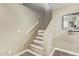 Staircase with white railings at 12517 W Santa Fe Ln, El Mirage, AZ 85335