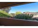A relaxing balcony view showcases lush greenery and a picturesque mountain backdrop at 1425 E Desert Cove Ave # 35, Phoenix, AZ 85020