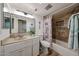 Well-lit bathroom boasts neutral tones, tub-shower, and updated vanity area at 1425 E Desert Cove Ave # 35, Phoenix, AZ 85020