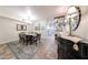 Dining area with elegant decor adjacent to an open kitchen layout at 1425 E Desert Cove Ave # 35, Phoenix, AZ 85020