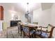 Elegant dining room with ornate chandelier, dining table, and spiral staircase at 1425 E Desert Cove Ave # 35, Phoenix, AZ 85020