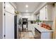 Bright kitchen featuring stainless steel appliances and ample cabinet space at 1425 E Desert Cove Ave # 35, Phoenix, AZ 85020