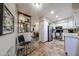 Bright kitchen with stainless steel appliances and white cabinets at 1425 E Desert Cove Ave # 35, Phoenix, AZ 85020