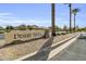 Desert Vista community entrance sign with palm trees and landscaping at 14754 W Amelia Ave, Goodyear, AZ 85395