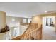 Bright two story foyer boasts wood banisters and ceramic tile entry at 1517 E Elaine Dr, Casa Grande, AZ 85122
