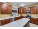 Well-appointed kitchen featuring stainless appliances, island, and abundant cabinet space at 1517 E Elaine Dr, Casa Grande, AZ 85122