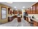 This kitchen boasts ample cabinet storage, stainless appliances, and a functional center island at 1517 E Elaine Dr, Casa Grande, AZ 85122