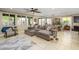 Inviting living room with a comfortable sectional sofa and lots of natural light at 15796 W Shaw Butte Dr, Surprise, AZ 85379