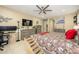 Relaxing main bedroom with a comfy bed, multiple dressers, and a ceiling fan for optimal comfort at 15796 W Shaw Butte Dr, Surprise, AZ 85379