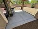 Spacious covered patio, opening to a large gravel landscaped backyard at 16010 N 170Th Ln, Surprise, AZ 85388