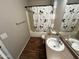 This bathroom features a shower-tub combo and modern vanity with countertop at 16010 N 170Th Ln, Surprise, AZ 85388