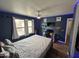 Bedroom with decor, featuring a desk and television at 16010 N 170Th Ln, Surprise, AZ 85388