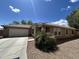 Attractive one-story home with a tile roof, desert landscaping, and a driveway at 16010 N 170Th Ln, Surprise, AZ 85388