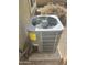 Close up of an outdoor air conditioning unit with EnergyGuide label in the backyard at 16010 N 170Th Ln, Surprise, AZ 85388