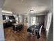 Cozy living area combines kitchen, dining, and living spaces at 16010 N 170Th Ln, Surprise, AZ 85388