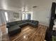 Comfortable living room with a large sectional sofa and neutral decor at 16010 N 170Th Ln, Surprise, AZ 85388