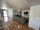 Open-concept living room with a large sofa and natural light at 16010 N 170Th Ln, Surprise, AZ 85388