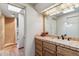 Bathroom featuring tile flooring, vanity and a walk-in shower at 1607 N Quartz Valley Rd, Scottsdale, AZ 85266