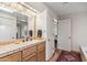 Charming bathroom features a vanity with a tile countertop and neutral wall color at 1607 N Quartz Valley Rd, Scottsdale, AZ 85266
