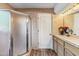 A bathroom showcasing a tile shower and vanity with light fixtures at 1607 N Quartz Valley Rd, Scottsdale, AZ 85266
