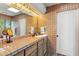 Bathroom featuring decorative tiles, a classic vanity, and ample lighting fixtures at 1607 N Quartz Valley Rd, Scottsdale, AZ 85266