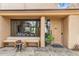 Inviting front entrance with seating area and decorative door at 1607 N Quartz Valley Rd, Scottsdale, AZ 85266