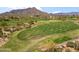 Expansive view of the meticulously manicured green fairways on the golf course at 1607 N Quartz Valley Rd, Scottsdale, AZ 85266