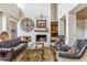 Cozy living area featuring a fireplace, comfortable seating, and decorative elements at 1607 N Quartz Valley Rd, Scottsdale, AZ 85266