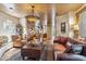 Inviting living space showcasing leather furnishings, tile flooring, and natural light at 1607 N Quartz Valley Rd, Scottsdale, AZ 85266