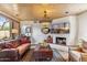 Warm living area with a fireplace, stylish decor, and a comfortable layout at 1607 N Quartz Valley Rd, Scottsdale, AZ 85266