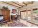 Charming office featuring a desk, comfortable seating, and an outdoor view of desert landscape at 1607 N Quartz Valley Rd, Scottsdale, AZ 85266