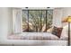 Inviting window seat offers a peaceful view and a comfortable spot to relax at 1607 N Quartz Valley Rd, Scottsdale, AZ 85266