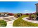 Landscaped backyard featuring a fountain and flower beds, perfect for outdoor relaxation at 16211 S 4Th St, Phoenix, AZ 85048