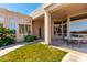Beautiful backyard featuring green grass, walkway and covered patio at 16211 S 4Th St, Phoenix, AZ 85048