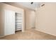 Neutral bedroom with closet, carpet, and beige walls at 16211 S 4Th St, Phoenix, AZ 85048