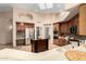Updated kitchen features stainless steel appliances, an island and ample counter space at 16211 S 4Th St, Phoenix, AZ 85048