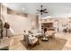 Comfortable living room with abundant natural light, vaulted ceilings, and seamless kitchen access at 16211 S 4Th St, Phoenix, AZ 85048