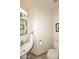 Bright half bathroom includes a pedestal sink, toilet, and mirror at 16304 E Crystal Ridge Dr, Fountain Hills, AZ 85268