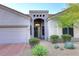 Charming home showcasing a well-manicured front yard, desert landscaping, and a welcoming entrance at 16304 E Crystal Ridge Dr, Fountain Hills, AZ 85268