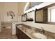 Well-lit bathroom featuring a double vanity with granite countertops and decor at 16304 E Crystal Ridge Dr, Fountain Hills, AZ 85268