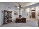 Office with a desk and display cabinet at 16304 E Crystal Ridge Dr, Fountain Hills, AZ 85268