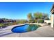 Beautiful backyard pool with a clear blue sky, mature landscaping, and mountain views at 16304 E Crystal Ridge Dr, Fountain Hills, AZ 85268