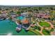 Aerial view featuring a beautiful lake and waterfront community, showcasing lush landscaping and pool area at 1633 E Lakeside Dr # 139, Gilbert, AZ 85234