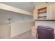 Cozy upper loft desk area includes built-in cabinets for extra storage and is carpeted for comfort at 1633 E Lakeside Dr # 139, Gilbert, AZ 85234