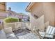 Charming outdoor patio with comfortable seating, decorative lattice, and views of the community at 1633 E Lakeside Dr # 139, Gilbert, AZ 85234