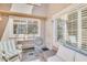 Inviting patio area with comfortable seating, tile flooring, and a view of the natural light at 1633 E Lakeside Dr # 139, Gilbert, AZ 85234