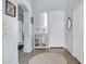 Inviting entryway with neutral walls, tile flooring, and decorative accents that create a warm ambiance at 16861 W Ironwood St, Surprise, AZ 85388