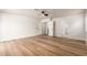 Large bedroom with wood floors, ceiling fan, and multiple doors leading to other areas at 2018 E Avenida Del Sol --, Phoenix, AZ 85024