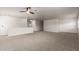 Large bonus room with neutral carpet, ceiling fan, and abundant natural light at 2018 E Avenida Del Sol --, Phoenix, AZ 85024