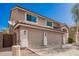 Exterior view showcasing a spacious three-car garage and beautiful landscaping, creating a welcoming appeal at 2018 E Avenida Del Sol --, Phoenix, AZ 85024